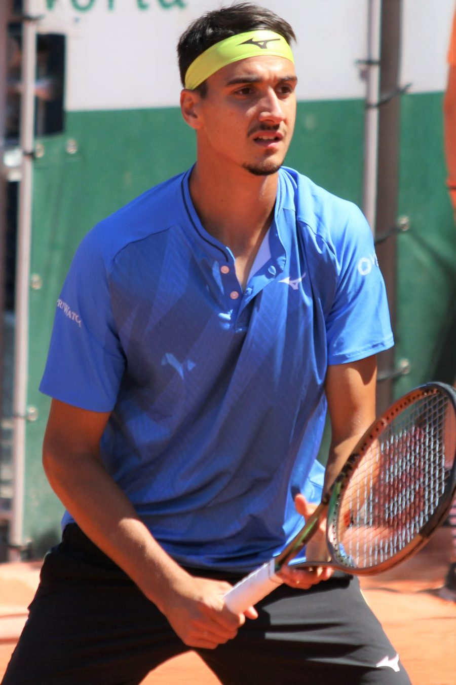 Lorenzo Sonego in campo durante un torneo del Grande Slam